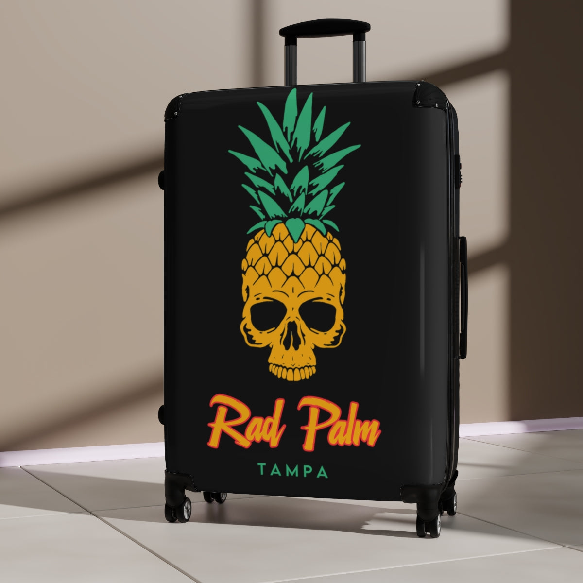 Bolsa de viaje con ruedas y diseño de calaveras de piña de Rad Palm 